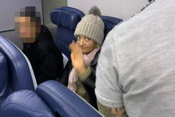 A stowaway on a flight to Paris is charged in federal court in New York and is temporarily detained